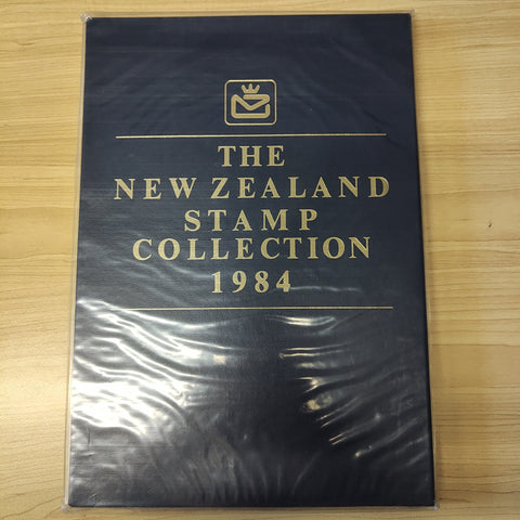 New Zealand 1984 Post Office Year Book containing all the different simplified stamps issued that year.