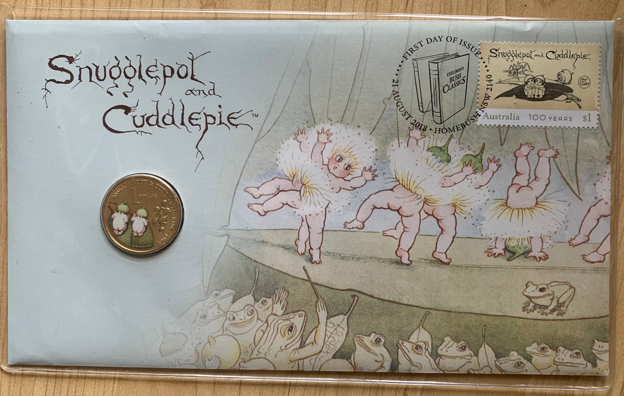 2018 Snugglepot and Cuddlepie PNC with $1 coin