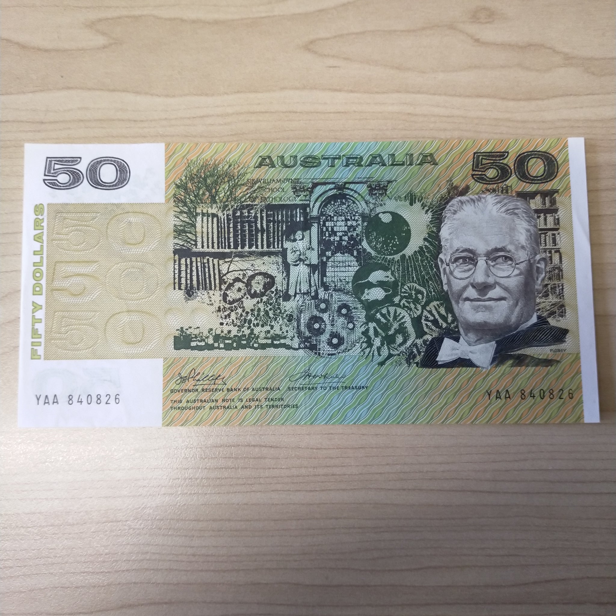 R505F Australian $50 Phillips Wheeler First Prefix aUnc Banknote - Light Fold