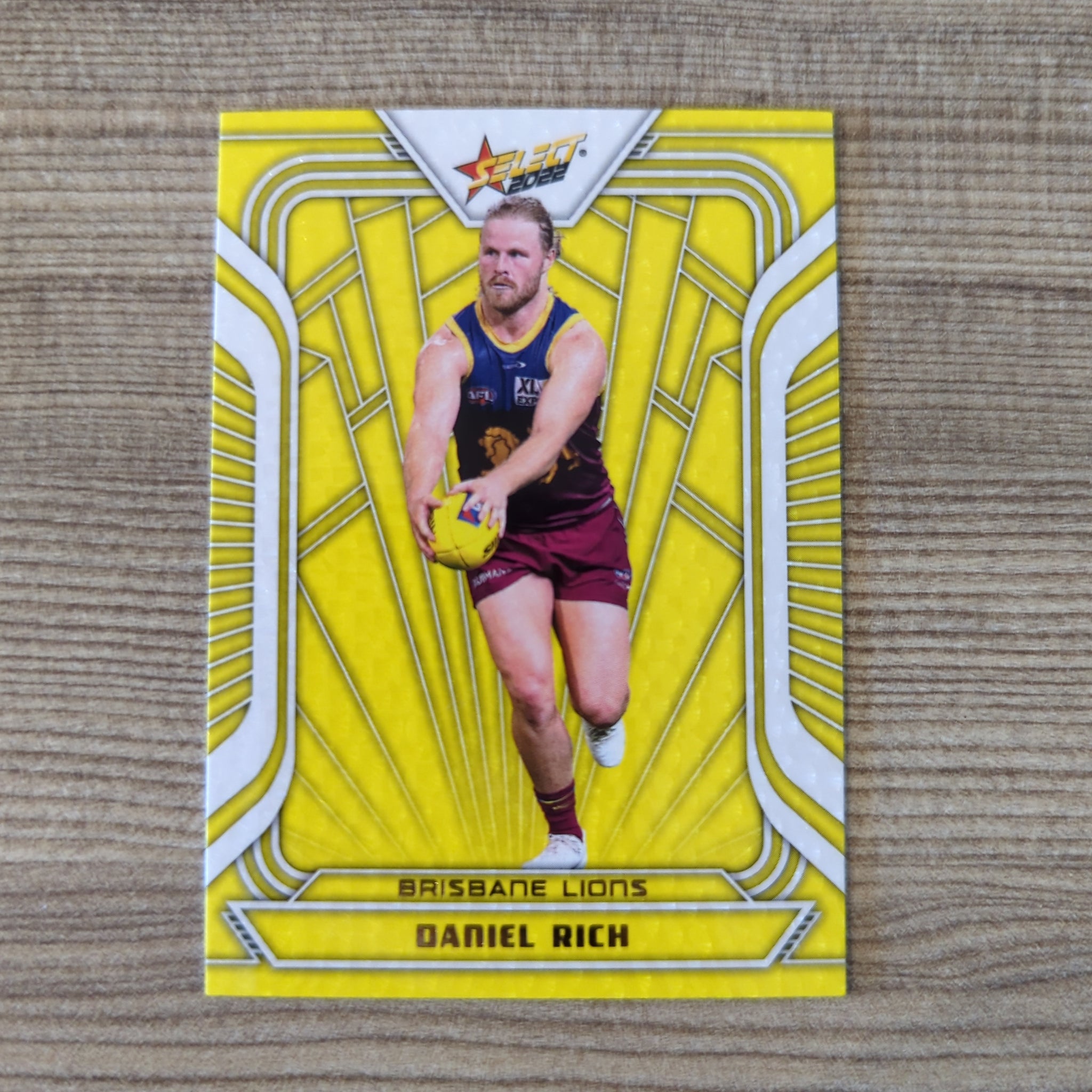 2022 AFL Select Footy Stars Fractured Yellow Daniel Rich Brisbane