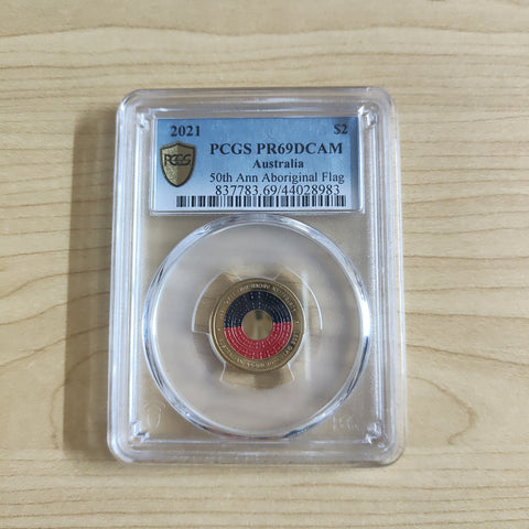 Australia 2021 Royal Australian Mint $2 50th Anniversary of the Aboriginal Flag Coloured PCGS Graded PR69DCAM Slabbed Coin