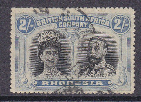 Rhodesia SG 178 2/- Black and dull blue KGV double heads P15 Used.