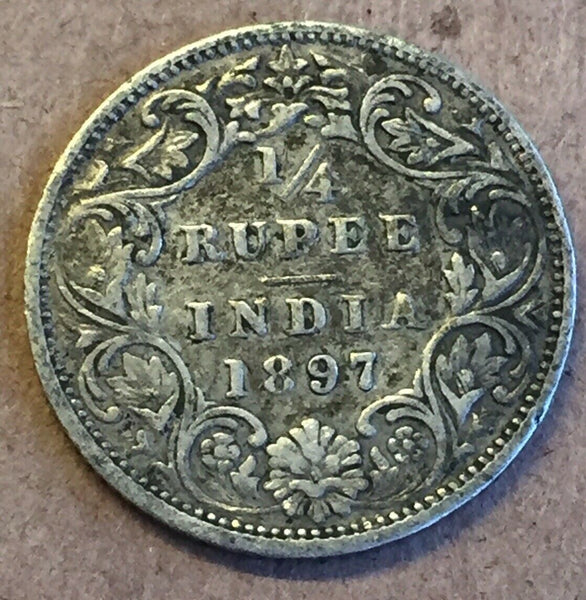 India 1897 Queen Victoria Silver 1/4 Rupee. Very Fine Condition.