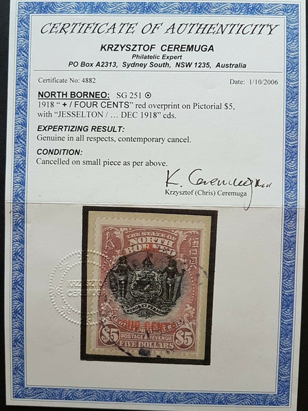 North Borneo SG 251 4c on $10 Arms. Fine used on piece with certificate