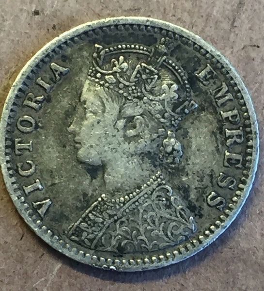 India 1897 Queen Victoria Silver 1/4 Rupee. Very Fine Condition.