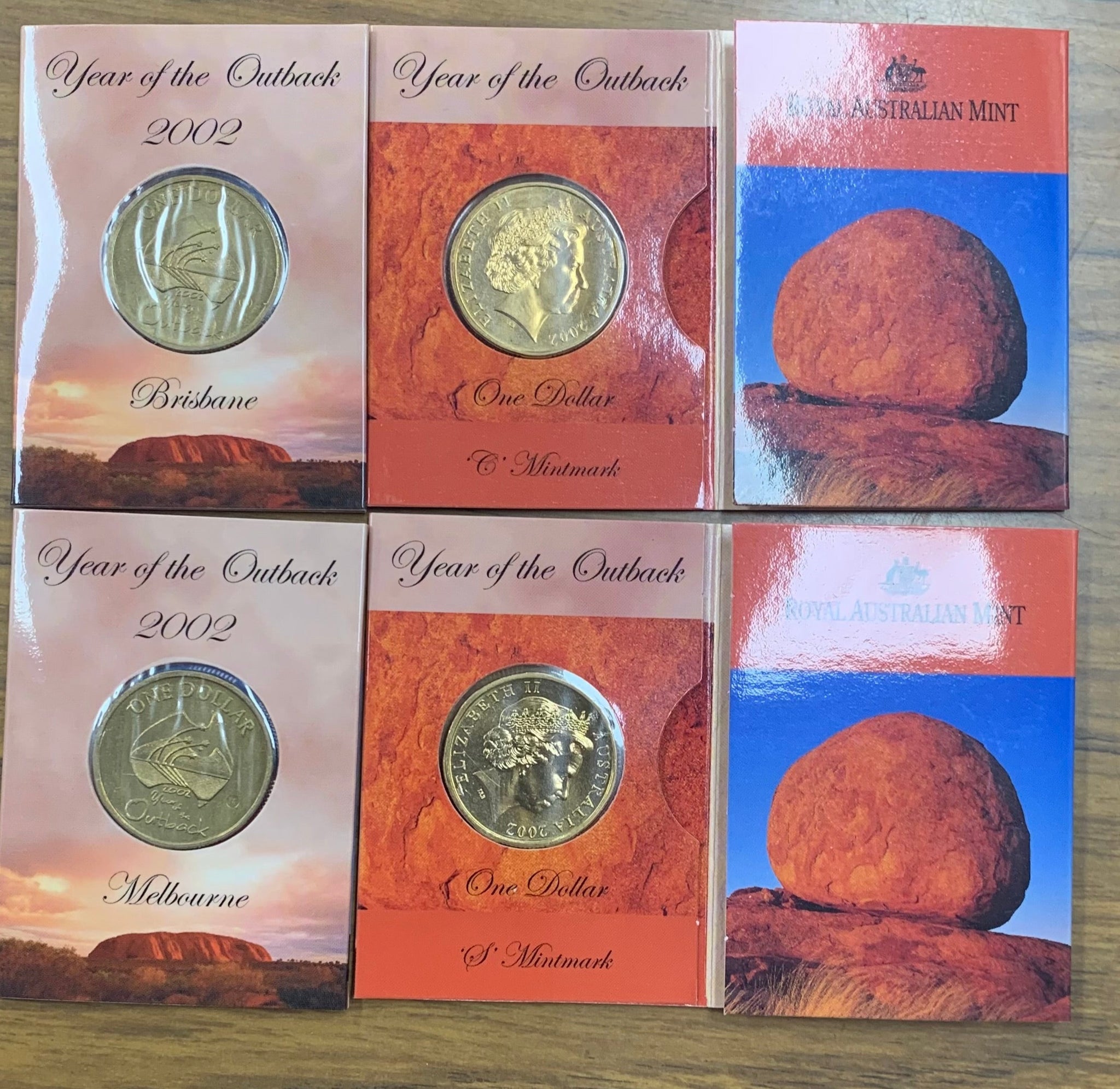 Australia 2002 Royal Australian Mint $1 Year of the Outback Uncirculated Coins B, C, M, & S mintmarks in RAM fdolders