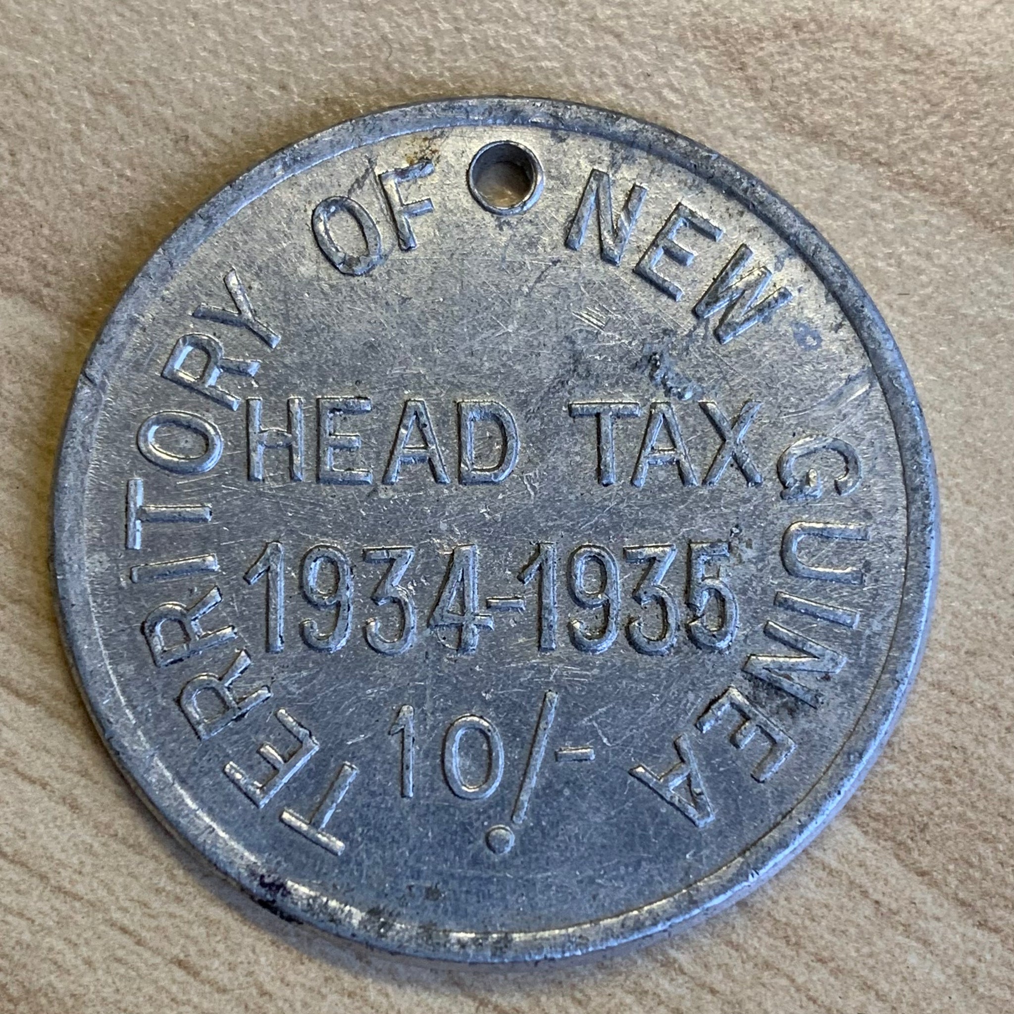 New Guinea 1934-1935 10/- Ten Shillings Head Tax Token